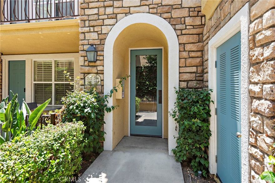 Welcome home to the prestigious 24-hour guard-gated, resort-like community of Northpark! Nestled within Northpark is Terra Bella, a quaint tree lined collection of Tuscany style condominium/townhomes. We are proud to offer 206 Terra Bella with its private location and popular 2 bedroom, 2 1/2 bath open floorplan. Step inside to soaring ceilings and an open-concept layout that feels bright and inviting. Recently renovated with contemporary influences including a kitchen island, white shaker cabinetry, granite countertops, modern tile backsplash and luxury laminate flooring this home is TURNKEY ready! Stainless steel appliances anchor the beautiful kitchen with balcony access and the master suite includes dual vanities and walk-in closet. The secondary bedroom is also impressively sized with a large closet, ideal for guests or a home office. A two car tandem garage is connected via dedicated hallway to your home. HOA amenities include community swimming pool, spa, tennis courts, picnic areas, and spacious clubhouse. Resort style living and prime location within Irvine! Close to award winning schools, shopping, restaurants, movies and recreational activities including walking trails and bike paths. This is the perfect blend of modern upgrades, thoughtful design, and community amenities in a location you'll love to call home. Don’t miss the opportunity to live in one of the area's most sought-after communities! Come and take a tour today!