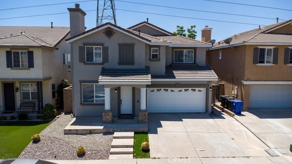 Move-in-ready 2-story home in Hunter’s Ridge, Fontana. Built in 2004, this beautifully maintained 4-bedroom, 3-bath residence boasts roughly 2,540 sq ft of living space on a 4,486 sq ft lot. The home features a spacious floor plan with a versatile loft/bonus room, a cozy fireplace, and sweeping territorial views from the rear yard. Entertainers dream featuring Quartz counter tops in kitchen and baths, beautiful vinyl flooring through out. The well-appointed layout includes central cooling, a tile roof, an attached 2-car garage, and tasteful upgrades throughout. Ideally located near both the 210 and 15 freeways, and in a desirable family and school-friendly community. Bring your fussiest buyers, this property will not be on the market long!