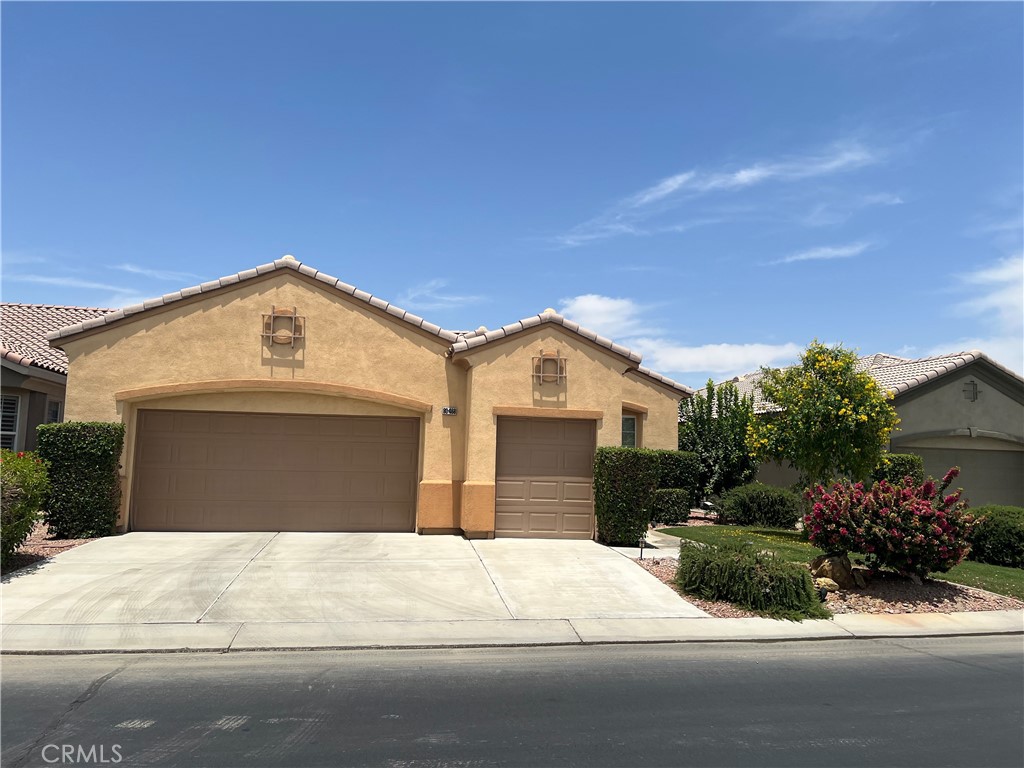 Welcome to Heritage Palms..an active 55+ senior gated community. Resort living at its best. This home has many wonderful features to include an open floor plan with tile and laminate floors throughout. The kitchen features a walk in pantry, stainless steel appliances and granite countertops. Master bedroom with walk in closet and dual vanities, walk in shower and soaking tub in the bath. Inside laundry room with lots of cabinets and utility sink. Oversized garage with golf cart parking. Spacious back yard with numerous fruit trees. Heritage Palms features one of the finest golf courses in the Coachella Valley and it is sole owned by the homeowners.
