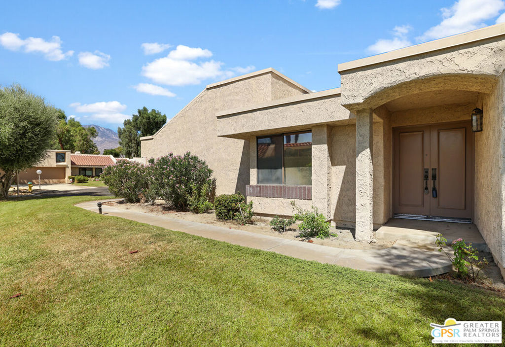 This three bedroom, 2 bath condo is located on a quiet green belt in the gated community of Cathedral Canyon Country Club. Price to sell and ready for your personal touch to make this home your own. Weather a seasonal visitor or a permanent resident Cathedral Canyon Country Club has everything to offer..... an 18 hole golf course, swimming pools, tennis courts and Jax's restaurant. Condo includes an attached 2 car garage, covered patios, a spacious primary bedroom and living room with vaulted ceilings, cozy fireplace and features an original bar with direct access to outside patio. Turnkey furnished.