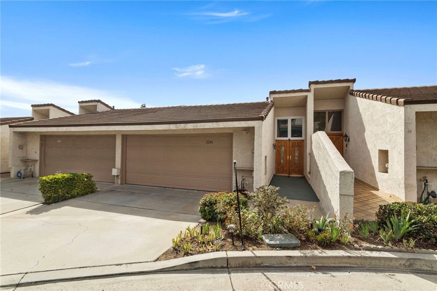 Nestled in a peaceful, picturesque neighborhood, you will wake up to tranquil hillside mornings, enjoy sunny afternoons with sparkling pool views, and unwind with golden sunsets over the tennis courts all from your private balcony and patio. This home features modern upgrades, engineered hardwood floors, and a spacious two-car garage for convenience and storage. Plus the community amenities include a clubhouse, tennis court, pool, and spa, and the HOA covers your cable, WiFi, water, and trash making life here both easy and enjoyable. Inside, you’ll find a bright, open floor plan perfect for hosting dinner parties, or cozy movie nights. Located just minutes from Disneyland, Cal State Fullerton, downtown Fullerton’s restaurants and shops, and major freeways, you’ll have the best of Orange County right at your fingertips. All that’s left to do is fill this inviting space with laughter and memories. Because life’s better when home feels like a fun escape and this one truly does.