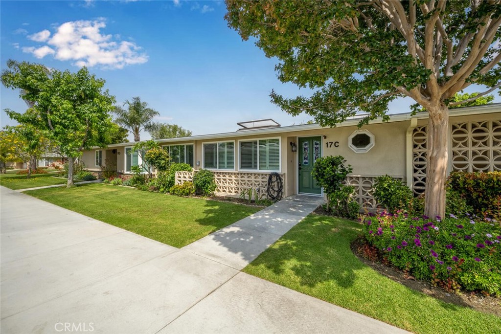 Don't miss the opportunity to own this beautifully updated 2-bedroom, 2-bathroom home just steps from the golf course in the highly sought-after Mutual 14 community. This inviting residence features wide-plank laminate flooring throughout and a versatile open layout designed to suit any lifestyle. The formal dining area is bathed in natural light from a skylight and enhanced with custom built-in cabinetry and an updated light fixture. The spacious living room offers ample space for even the largest furnishings and includes a flexible area ideal for a home office or additional seating. The completely remodeled kitchen is a chef’s dream, showcasing sleek Shaker-style cabinetry, granite countertops, and a full suite of stainless steel appliances—including a built-in microwave, dishwasher, and full-size oven/range. The expansive primary suite has been thoughtfully enlarged to accommodate a king-size bed and features a walk-in closet. The luxurious en-suite bath includes a spa-style sit-down tub, an updated vanity, and a full-size stackable washer and dryer. Perfect for guests, the second bedroom functions as a private suite with its own ¾ bathroom. Additional upgrades include central HVAC, energy-efficient double-pane windows with plantation shutters throughout, and turnkey condition for truly stress-free living. This is the ideal home for anyone seeking style, comfort, and convenience—all in a prime location. Just move in and enjoy! SENIOR COMMUNITY-OFFERS THE FOLLOWING AMENITIES: 9 Hole Golf Course, Swimming Pool, Jacuzzi, Gym, Table Tennis, Shuffle Board, Billiards, Pickle Ball, and Bocce Ball courts. Amphitheater, 6 Clubhouses featuring: Art Room, Sewing, Crafts, Wood Shops, Lapidary, Pool Tables, Over 200 Clubs, LWSB is a Security-Guard-Gated Community. Also Library, Friends of Library Bookstore, Credit Union, Health Care Center, Pharmacy and Post Office (CARPORT 153, SPACE 3).