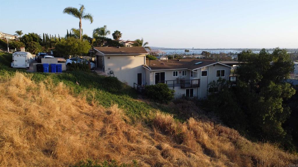 100k PRICE REDUCTION!! VIEWS! VIEWS! VIEWS! Incredible opportunity to own a prime vacant lot with breathtaking Bay and Ocean views in the highly desirable Bay Park neighborhood! Build your dream home or invest in rental properties with stunning coastal scenery. vacant lots in a well-established neighborhood. SELLER FINANCING AVAILABLE Please access from Ticonderoga St. see picture. set GPS to 3504 Ticonderoga St Four separate lots available for sale: They are all next to each other. APN 4250422400 (mls#PTP25003788), 4250422500 (MLS#PTP25003787), 4250422600 (MLS#PTP25003786), 4250422700 (MLS#PTP25003785) – each sold separately. The access is from Ticonderoga St. There will be an extended driveway to access lots from that street. Please see picture so identify what driveway will be extended. Go through that driveway to access lots. Renders and design plans showcasing potential builds are available. Buyer to verify all information and conduct due diligence before purchase. Seller open to entertaining all reasonable offers. Don’t miss this rare chance to secure a piece of Bay Park’s finest views!