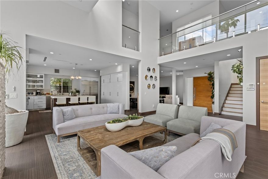 Just a short stroll away are grocery stores, cafés, restaurants, and a lovely local park!

Furnished, modern-contemporary gem in the prestigious Encino Hills. This two-story home spans nearly 4,000?sq?ft, offering 5 bedrooms and 4½ bathrooms, with a clean-lined design, expansive windows, and seamless indoor-outdoor integration. The open-concept living space is drenched in natural light, highlighted by lofty ceilings, premium finishes, and a gourmet kitchen featuring custom cabinetry and top-tier appliances—perfect for entertaining or everyday life.

Available Furnished or Unfurnished.