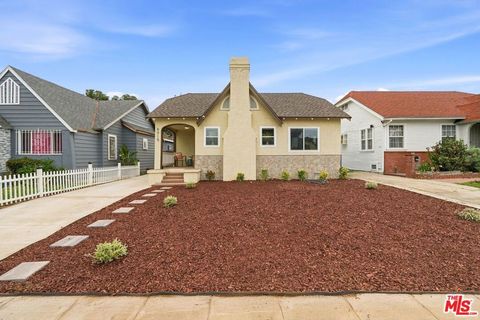 Photo of 6015 Keniston Avenue, Los Angeles, CA 90043 (MLS # 26739373)