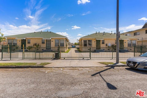 Photo of 1000 N Sloan Avenue, Compton, CA 90221 (MLS # 26989749)