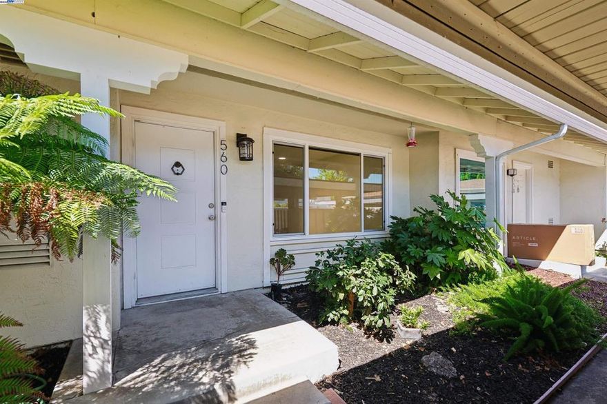 Beautiful NORTHEAST facing townhome tucked at the end of a quiet court in the desirable Twin Creeks neighborhood!  Recently updated with beautiful elegant oversized tile flooring & baseboards in the living room/dining room/kitchen.  Large spacious light filled living room has been recently updated with new recessed lighting and ceiling fan.  Updated modern kitchen with quartz countertops, full tile backsplash, gray cabinetry, and stainless steel appliances, including refrigerator.  Dining Room with plenty of space for entertaining opens to the private back patio with mature shade tree and storage.  Guest bathroom is located off kitchen and laundry closet in kitchen with washer and dryer included has additional overhead storage cabinets.  Spacious primary bedroom upstairs w/mirrored closet doors, new ceiling fan and large window overlooking backyard.  Two additional bedrooms with mirrored closet doors and recently added overhead lights.  Updated full bathroom with newer vanity, sink, light fixture & mirror.  This move-in ready home also features Nest Smart Thermostat, Dual Pane Windows, 1 Assigned Carport Parking Space, Ample Guest Parking and Community HOA Pool.  Located close to top-rated San Ramon Schools, parks, shopping, dining, City Center Bishop Ranch & Easy Freeway Access.