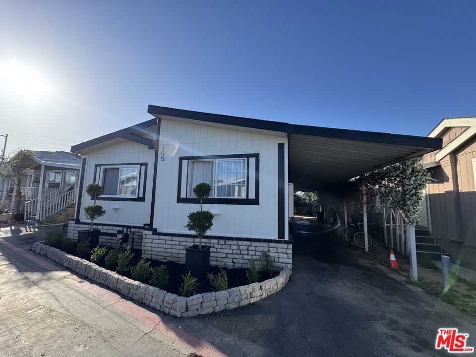 A true gem in Coach Royal this beautifully upgraded and completely turnkey home is one of the finest you'll find in the neighborhood. Every detail has been thoughtfully renovated with high-end finishes and long-lasting improvements, offering a rare opportunity to own a mobile home that feels like a custom build.Inside, enjoy a spacious open-concept layout with brand-new flooring, a fully updated underfloor system, a modern kitchen with sleek new countertops, and a brand-new air conditioning system to keep you comfortable year-round. The home is move-in ready with nothing left to do.The exterior has been triple-painted for enhanced waterproofing and protection, combining style and durability that stands the test of time. The bathroom is a true showpiece, finished with oversized Calacatta-style tile walls and elegant golden metallic accents a luxurious space rarely seen in homes at this price point.This is a one-of-a-kind offering in Coach Royal. Make this your home.