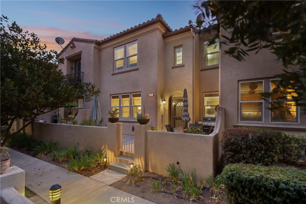 FANTASTIC SKYVIEW RIDGE HOME W/ UPGRADES! This is the one you've been looking for! Built by DR Horton in 2005, this well designed home & complex has so much to offer! The entry has a spacious patio with room for a BBQ, table, and is perfect for outdoor entertaining. The downstairs living space boasts an open concept, tying together the dining, living area and kitchen seamlessly. You're sure to appreciate the open feel that the high ceilings create. The living area has an entertainment nook, crown molding and an upgraded gas fireplace. The kitchen has tile counters, plenty of cabinetry w/ storage and gas appliances. There's direct access to the 2-car garage as well! The downstairs bathroom has been upgraded w/ a newer vanity, mirror and stylish light fixture. Upstairs you'll find all three spacious bedrooms. The secondary rooms are both larger than you'd expect and have plenty of natural light. The primary suite is a great size and has direct access to a private bath w/ a dual vanity and shower/tub combo. ***Other upgrades to note*** A whole-house IQ Air Purifier was installed this year, the A/C condenser & coil were upgraded late last year, the garage door has a new motor & springs and there is a custom glass entry door. Skyview Ridge offers access to two pools, a playground, a grass area and there's plenty of guest parking throughout the community. There's also a trailer storage area which is just a little extra per month. Talk about a convenient location!!! Costco, Aldi and several dining options are all a short walk away! Looking for something to do in the area? The Temecula wineries are close or go enjoy Los Alamos Hills Sports Park! Be sure to come take a look at this great home before it's to late!!! ***VA & FHA Approved Complex***