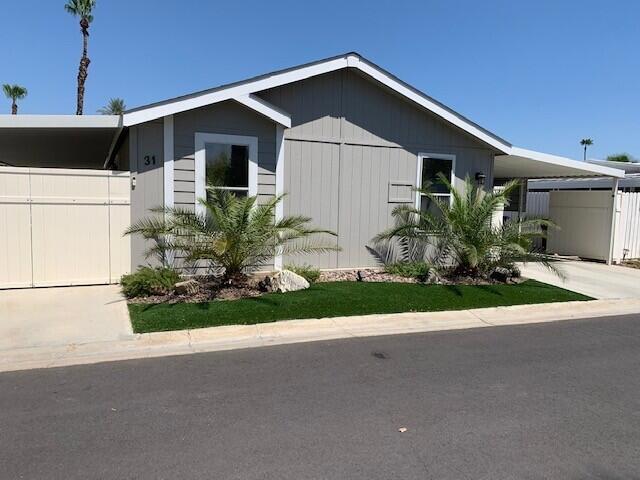 2012 manufactured home in almost new condition. Approx. 1140 sq. ft. three bedrooms and two bathrooms., cathedral ceilings This home is in immaculate condition and ready for you to move in. Owner moving out of state. Conveniently situated almost next to RV Storage, if you own one. Privacy gates close off the main entry and driveway . Large low maintenance yard area is ideal for your pet as is private and fenced. Also great for outdoor entertaining.Located between Palm Springs and Palm Desert, this home is ideally located for fine dining and world class entertainment. Eisenhower and Desert Regional hospitals are minutes away.Nick's Italian Bistro is on site to serve beverages and good eats. There are three main pools with hot Tubs. Library, sauna, Gym . and Pavilion with table tennis and pool tables. Also available for private party's. Main Clubhouse for special functions. There are Dog runs for large and smaller pets, plus pet walking areas.Appliances are approx 3 years old. Fridge 2 years. A/C 3 years. Home has Water filter system. Ceiling fans in Living room and primary bedroom. Both bathrooms have tub with shower over. Laminate vanity. Kitchen has 5 burner gas range plus microwave..