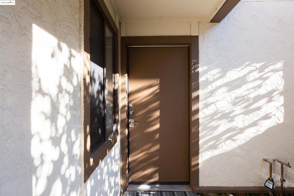 Beautiful Gated Community, close to Freeway, Shopping and Public Transportation. This is great for a first time buyer or a great investment. This 1 bedroom, 1 Bathroom has recently been upgraded that includes an updated bathroom, kitchen, flooring throughout the unit and new interior paint. Kitchen has plenty of cabinet, with a spacious breakfast bar-perfect for entertaining. This condo is Equipped with an efficient stackable washer and dryer. All appliances stays. Unit also features central air and Central heat. Both the living room and bedroom feature floor-to-ceiling mirrored closet doors, creating an illusion of depth and a brighter, more open atmosphere. Enjoy a nice-sized patio with an enclosed storage area. This community offers a pool for your enjoyment.. Move in ready. Don't miss out