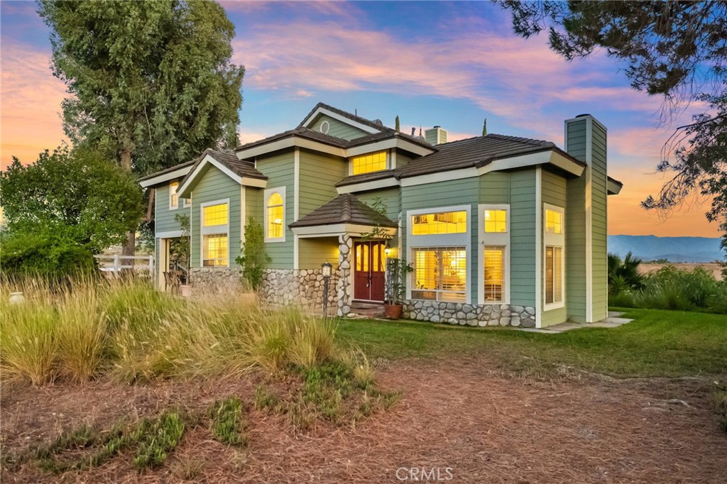 Nestled in the heart of Temecula Valley’s Wine Country—just a half mile from the famed Rancho California Wine Trail—this expansive 6-bedroom, 5.5-bathroom estate offers a rare blend of rural tranquility, modern upgrades, and multi-generational living potential. Spanning 4,166 sq ft, the thoughtfully reimagined layout includes a versatile lower-level conversion, transforming the former California walk-out basement and garage into two fully renovated guest suites with en-suite baths and a laundry room with an added half bath—ideal for guests, extended family, or income potential. Set on a private, fenced, and gated lot, the property boasts two Tesla EV chargers, and a 400A electrical service—all supporting sustainable living. Outdoor features include a saltwater pool (converted in 2019 with a new salt cell in 2024), outdoor shower, pool safety fencing, and space to entertain under a 2022 Alumawood patio cover. For the equestrian or hobbyist, there’s a 4-stall barn, storage shed, and ample flat land for a future garage, ADU, pickleball court, or workshop. With three RV hookups (each with 50A electric, water, and septic tie-in to a 1,500-gal tank), parking for 20+ vehicles, and dual septic systems, this property is truly built for flexibility and future expansion. Recent upgrades include 2 new HVAC zones, dual tankless water heaters, reverse osmosis drinking water, high-efficiency mini-splits, soundproofed guest suite, and numerous infrastructure improvements—all completed between 2018 and 2025. Whether you're seeking a peaceful retreat, a multi-gen solution, or a luxury compound with income potential, 36350 Calle Poco delivers a turnkey opportunity in one of Temecula’s most desirable locations.
