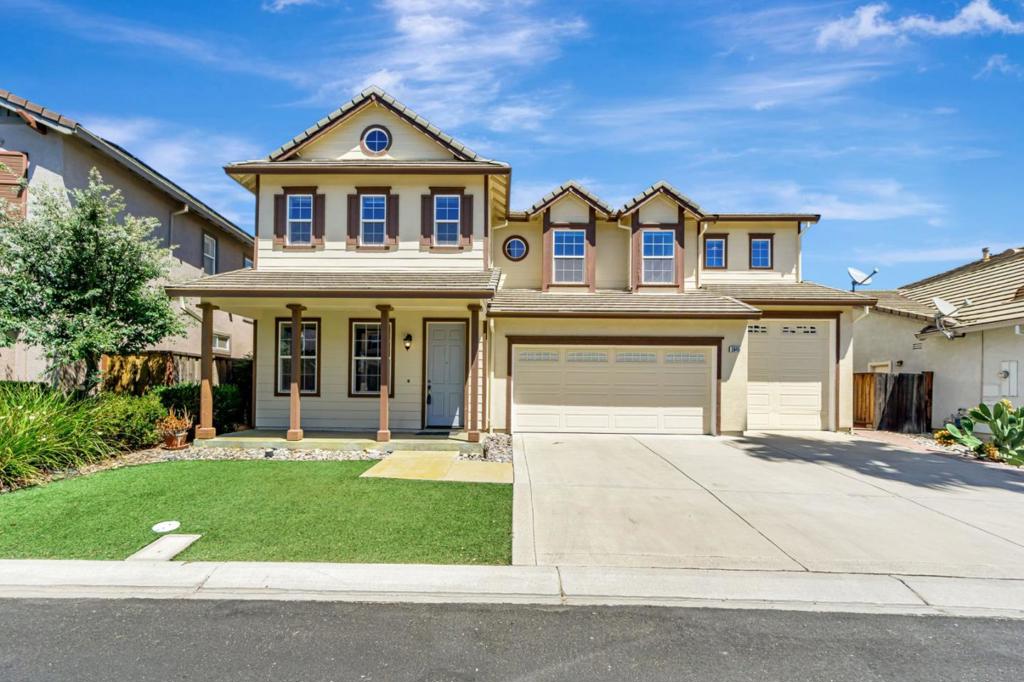 Welcome to this beautiful 5-bedroom, 3-bath home in the highly sought-after gated Lakeshore community of Discovery Bay! This spacious home features abundant natural light, and a bright open floor plan with formal living and dining rooms. The kitchen-family room combo offers a large island, ample cabinet space, recessed lighting, and a cozy fireplace, perfect for entertaining. Downstairs includes a full bedroom and bath, laundry room, and a rare FOUR-car garage with a 10 Boat/RV garage parking space. Upstairs has four additional bedrooms, plus the large bonus room that provides endless flexibility such as as a 5th bedroom, game room, or second living area. The luxurious primary suite boasts a soaking tub, stall shower, dual vanities, and oversized walk-in closet. Additional highlights include durable LVP flooring though out the house, a water softener, and pre-wired audio. The spacious backyard is ready for your custom outdoor living design, perfect for barbecues, relaxation. Enjoy Lakeshores resort-style amenities including a gated entrance, sparkling community pool, playground, and scenic lakefront walking trails. This home blends space, comfort, and lifestyle in a peaceful, family-friendly setting.