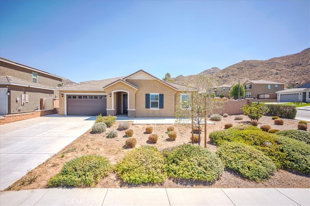 Welcome to this beautifully rehabbed, move-in ready 1-story home, located North Riverside just minutes away from UCR. Enjoy the benefit of PAID OFF SOLAR PANELS! Newer home with a lot of upgrades throughout. Property has 4 Spacious Bedrooms, and 2.5 Bathrooms featuring a master bath with both a shower and a separate soaking tub for ultimate relaxation. The Kitchen was upgraded with sleek granite countertops, huge kitchen island, pantry, high ceilings, open concept, with a very large separate den perfect for entertaining and hosting. The very large primary suite is an amazing retreat, with ample space and equally spacious walk-in closet. The Primary bath features double sinks, a bathtub and separate shower! Fully landscaped back yard, and drought friendly front yard for added convenience!