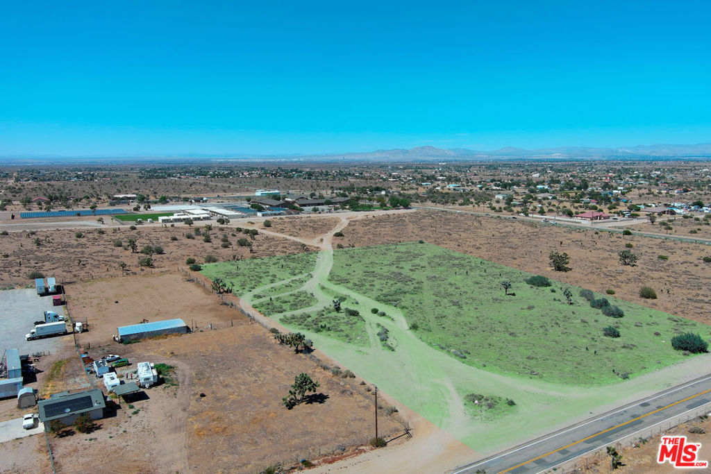 Incredible opportunity to own 5 acres of flat, buildable land in the heart of Phelan. Located near the intersection of Yucca Terrace Drive and Arrowhead Road, this expansive 217,800 square foot parcel offers the ideal canvas for a custom estate, equestrian setup, or potential multi-unit development (buyer to verify). Situated near a local school and just minutes from shopping, dining, and major commuter routes, this location provides both convenience and privacy. With utilities nearby and a generous footprint, this is a rare chance to secure prime land in a growing High Desert community. Bring your vision and make it a reality.