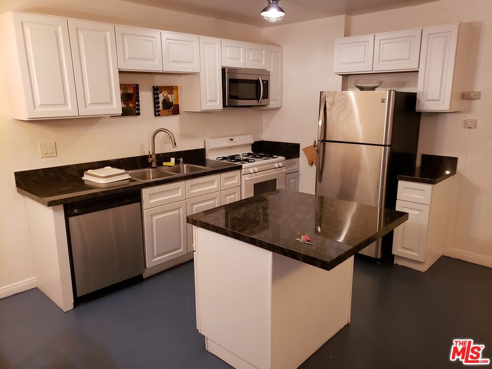 Fully renovated condo in Los Angeles. The kitchen leads into an open concept living and dinning space. Private bedroom with balcony. The bathroom has a tub and single vanity. First floor unit. Assigned covered parking spot. Onsite washer and dryer. Water, trash and sewer included in rent. Section 8 approved.
