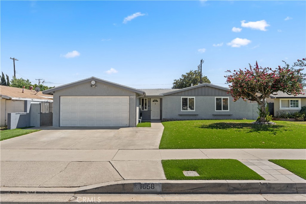 Welcome to 1658 W. Crone Avenue, a beautifully maintained single-family home in the heart of West Anaheim. This 4-bedroom, 3-bathroom residence offers approximately 1,527 sq. ft. of comfortable living on a 6,466 sq. ft. lot, perfect for families or first-time homebuyers.
Step inside to find new interior paint, newly installed baseboards, and new laminate flooring throughout. Along with a bright open floor plan with plenty of natural light, a spacious living area, a kitchen designed for both cooking and entertaining. The bedrooms feature mirrored sliding door closets, providing plenty of storage.
Home includes a water softener filtration system and the Roof is only a few years old.
Enjoy a low-maintenance front yard with artificial turf, perfect for kids, pets, or entertaining. The home also features an attached garage with built in cabinets and additional driveway parking.
This backyard offers a large footprint with the unique history of having once included a pool and spa. The space has been filled in and leveled, providing a blank canvas ready for your personal touch—whether you dream of a lush garden, outdoor kitchen, or even reinstating a pool.
Conveniently located just 1.5 miles from Disneyland, and near local schools, shopping, and major freeways, this property combines comfort, functionality, and location.
Don’t miss the opportunity to make this Anaheim gem your new home! Schedule your showing today..