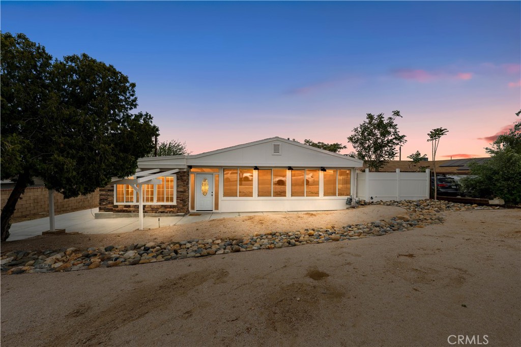 Discover the charm of suburban living with this beautifully renovated, single-story home nestled in the heart of Quartz Hill. This one of a kind home has direct street access from L14 & L13. This unique feature 100% allows for ADU possibilities. This delightful property promises comfort and style with its recent updates, including fresh paint, sleek quartz countertops, and modern stainless steel appliances. Indulge in the luxury of the meticulously tiled main bathroom, featuring a separate tub for soaking and a stand-up shower for brisk mornings. Boasting a spacious 1,228 square feet, this home includes two cozy bedrooms and one bathroom, ideal for new families or downsizers seeking a serene lifestyle. The vast lot provides unique dual access from both avenues, enhancing its convenience and allure. Whether you're a gardening enthusiast or an RV owner, the expansive outdoor space is your canvas. Situated minutes away from Westside Academy, this location ensures your educational needs are met with top-tier schooling options. Not to mention, LD Lawncare Park is just a stroll away, perfect for those leisurely weekend picnics or your morning jogs. This property not only allows, but welcomes your four-legged friends and even offers ample space for horse lovers to revel in. With such a blend of accessibility, updates, and charm, this home is not just a living space but a place to thrive and create lasting memories. Ready to saddle up and call this place home? Your suburban dream awaits.