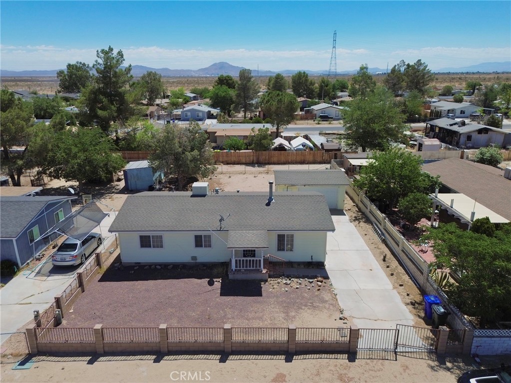 Charming house features 2 beds and 2 baths. Walk into a cozy living room with a fireplace. Kitchen features quartz countertops and tile flooring. Master bedroom with private bathroom. Inside laundry room. And a one car detached garage. MUST SEE TO APPRECIATE!!!