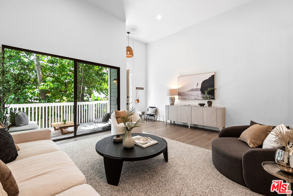 Beautifully renovated corner unit townhome offering 2-bedrooms, 2.5-bathrooms, plus a private over 400 sq.ft. 2 car garage, and located just blocks from the beach, on the Silver Strand in Marina del Rey. This highly sought-after unit offers designer details throughout such as wide plank oak floors, recessed LED lighting,, and more! Offering a spacious living room with direct access to a private patio to enjoy ocean breezes and a chef's kitchen with stainless steel appliances, granite counter-tops, and adjacent dining area. Upstairs you will find two bedrooms including the primary suite with an over-sized walk-in closet and en-suite bathroom with a dual vanity. This unit also includes in-unit laundry, a powder room, and central HVAC system. Complex offers a sun deck, year-round heated outdoor pool, large hot tub, gym and sauna. Close to all the Marina has to offer!