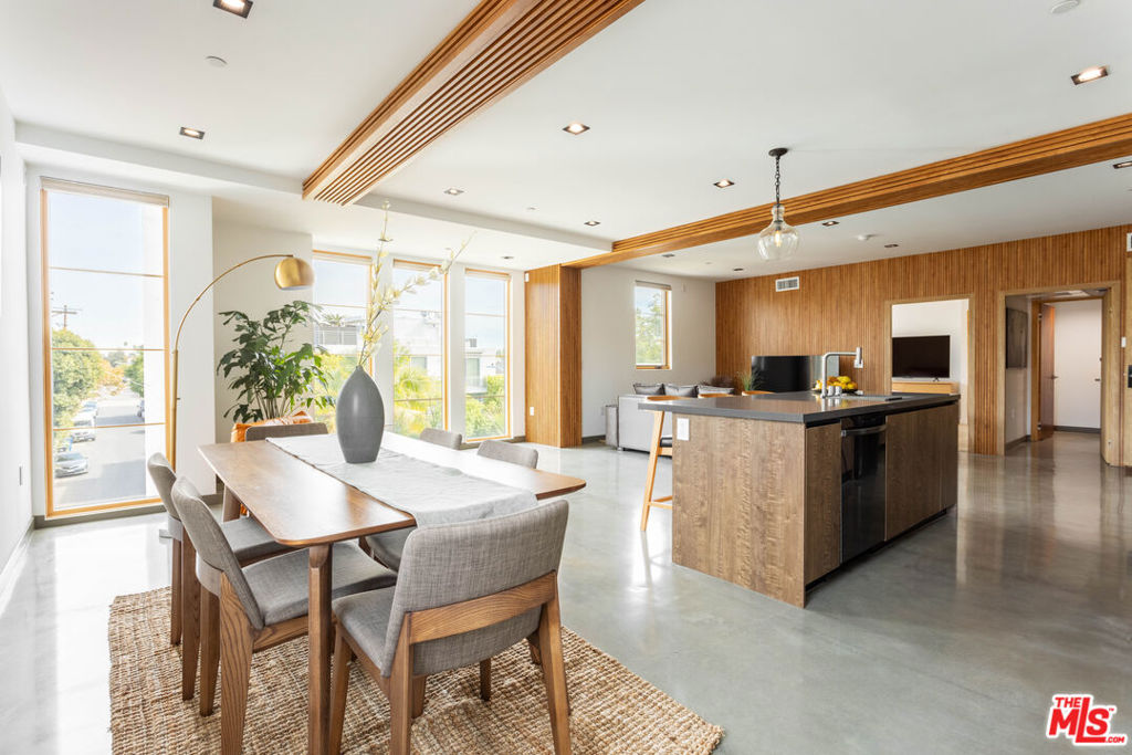 Making its debut in one of West Hollywood/Beverly Grove's most coveted locations, 547 Sweetzer is a brand-new contemporary building bringing modern design, elevated amenities, and boutique-quality living to the neighborhood. This spacious 1 bedroom, 1.5 bathroom residence showcases polished concrete floors, oversized windows with remote-control power shades, Nest-controlled central heat and air, and an open-concept layout with a sleek kitchen outfitted with brand-new appliances. The bedroom is a private suite with a spa-inspired bathroom, complemented by a stylish powder room and thoughtful storage throughout. Residents enjoy an expansive rooftop sundeck with sweeping city views, a 24-hour camera security system, and a gated subterranean garage with two side-by-side parking spaces plus a private storage unit. Available furnished or unfurnished, this home blends modern luxury with everyday convenience-just steps from Melrose Place, West 3rd Street, and Beverly Boulevard's premier dining, cafes, and boutiques.