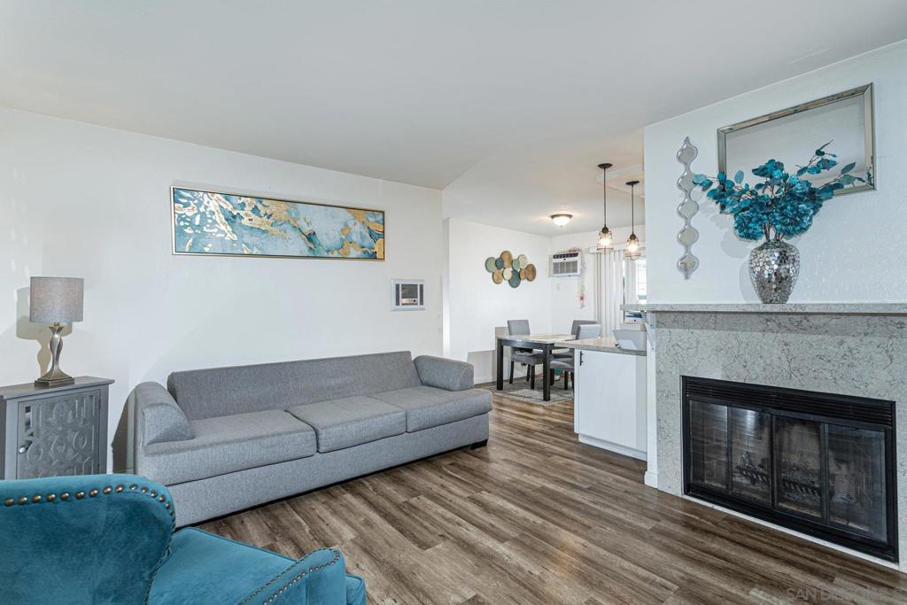 Don't miss this one! Stylish VA approved North Park Condo with Rare 3-Car Parking! Welcome to this beautifully updated condo in the heart of North Park, offering a rare combination of comfort, convenience, and unbeatable location. This spacious unit includes a private 1-car garage plus 2 additional dedicated parking spaces—a true find in this vibrant neighborhood. Inside, you’ll find brand-new flooring, a modern kitchen featuring a new dishwasher and stove, and the convenience of a IN -UNIT washer and dryer. Step out onto your private balcony—perfect for morning coffee or relaxing evenings. The primary bedroom is generously sized, complete with a walk-in closet and en suite bathroom. With a low HOA fee of just $225/month, enjoy added value that covers water, trash, and sewer. Located just minutes from North Park’s trendiest restaurants, nightlife, SDSU and freeway access, this home puts everything you need right at your doorstep. Don’t miss the opportunity to own a turn-key condo in one of San Diego’s most desirable neighborhoods.