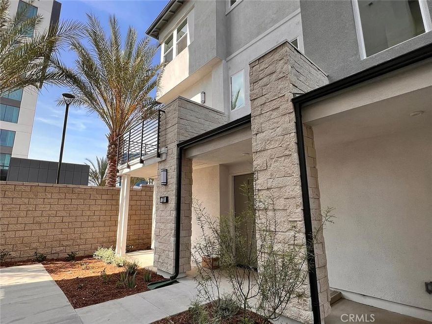 This quiet, freshly painted 3-story corner end unit features 3 bedrooms and 3.5 bathrooms, offering a smart and functional layout. The first floor includes one bedroom with a nearby full bath, and a convenient 2-car garage.

The second floor is bright and open, with combined living and dining areas perfect for everyday living or entertaining, plus a separate half bath for guests or family. 

On the third floor, you'll find a versatile loft space—ideal for a family room, office, or reading area—along with a secondary bedroom, full bath, laundry room, and a spacious primary suite.

Enjoy access to the rooftop deck with beautiful views, and Disney fireworks!