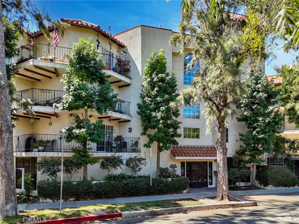 When the word Immaculate was invented - this condo was its inspiration! An incredible corner unit with wrap-around balconies: 1 balcony faces east – bringing-in beautiful sunrise’s soft light, and 2n balcony faces north – immerse yourself in soothing views of the L.A. River’s mature trees where butterflies are dancing in the air and hummingbirds are hovering about. Though you’re just one block from bustling Ventura Blvd. you feel nature all around you. A peaceful living experience. The interior layout is superb: two primary bedrooms each one is separated from the other by the dining and living spaces - a floor plan that accommodates roommates situation or a separate home-office or studio. Every element in this condo is in mint condition. The kitchen opens to the dining area and living room thru a breakfast bar – the open floor concept that is so much liked when you entertain and wish to interact with your guests and family while preparing the meal. To highlight just some of the elements that make this home a HOME are: L.E.D. recessed lights, stainless steel appliances, in-unit laundry, and more. Did we emphasize the location? It is unparallelled: we’re walkable to The Boulevard’s restaurants, coffee houses, shopping, boutiques, supermarket… and The Sportsmen’s Lodge new mall. Minutes to Beverly Hills through Coldwater Canyon and to downtown via Hollywood FWY (101) and to the Studios (via FWY 134.) Central and yet peaceful. EQ Insurance!