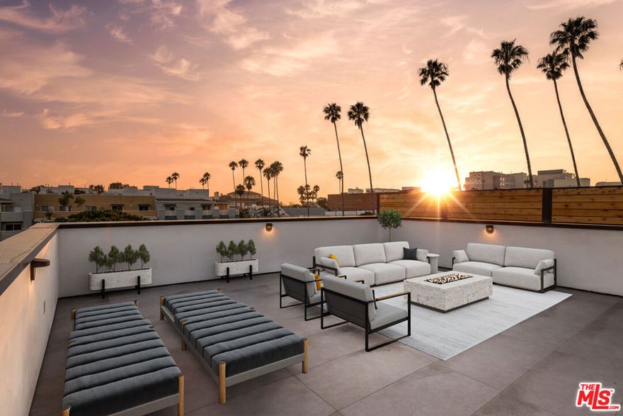 Discover the second release in an exclusive three-residence boutique development. This brand-new coastal retreat spans 2200 sq. ft. and is just seconds from the sand. Blending privacy with modern sophistication, the home offers expansive, light-filled interiors finished with a sleek, contemporary design. The chef-inspired kitchen is equally suited for daily living and entertaining, opening seamlessly to the generous living and dining areas. Multiple outdoor spaces provide serene retreats to soak in the sun and ocean air, while two generously sized bedrooms offer spa-inspired ensuite baths. A private rooftop deck, engineered to support a spa and complete with a wet bar, creates a show stopping setting for entertaining or unwinding under the stars. Additional highlights include two secure parking spaces (with the option to purchase a third) and side-by-side laundry. All of this in a premier beachside location, moments from Main Street's acclaimed restaurants, cafes, and boutique shopping. Some images have been virtually staged/enhanced.