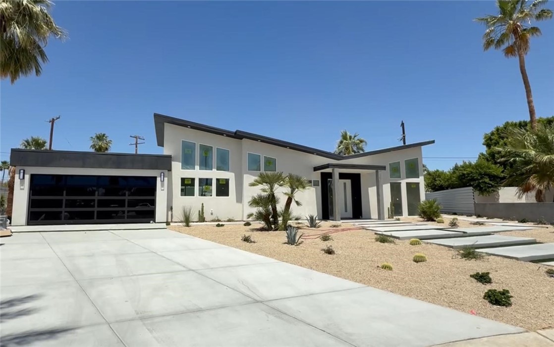 Discover the perfect blend of luxury, versatility, and stunning mountain views at this newly built estate in Palm Springs. Set on a generous 13,939 sq ft lot, this beautifully designed property features a total of 6 bedrooms and 5.5 bathrooms across three distinct living spaces — ideal for multi-generational living or income potential.
The main residence offers 3 spacious bedrooms and 2.5 bathrooms with an open-concept layout, high ceilings, and designer finishes throughout. A chef’s kitchen with sleek cabinetry, premium appliances, and an oversized island flows effortlessly into the living and dining areas, creating the perfect space for entertaining or everyday comfort.
An attached junior ADU includes 1 bedroom and 1 bathroom, complete with its own private entrance, offering privacy for guests, in-laws, or tenants. A separate detached ADU features 2 bedrooms and 2 full bathrooms, also with its own dedicated entrance, making it an excellent option for rental income or extended stays.
Outside, enjoy a true resort-style setting with a sparkling pool, lush landscaping, and panoramic mountain views that capture the magic of Palm Springs living.
Whether you’re looking for a luxury home with guest accommodations, a profitable investment property, or your own private retreat, 2197 Jacques Dr offers endless possibilities in an unbeatable location.