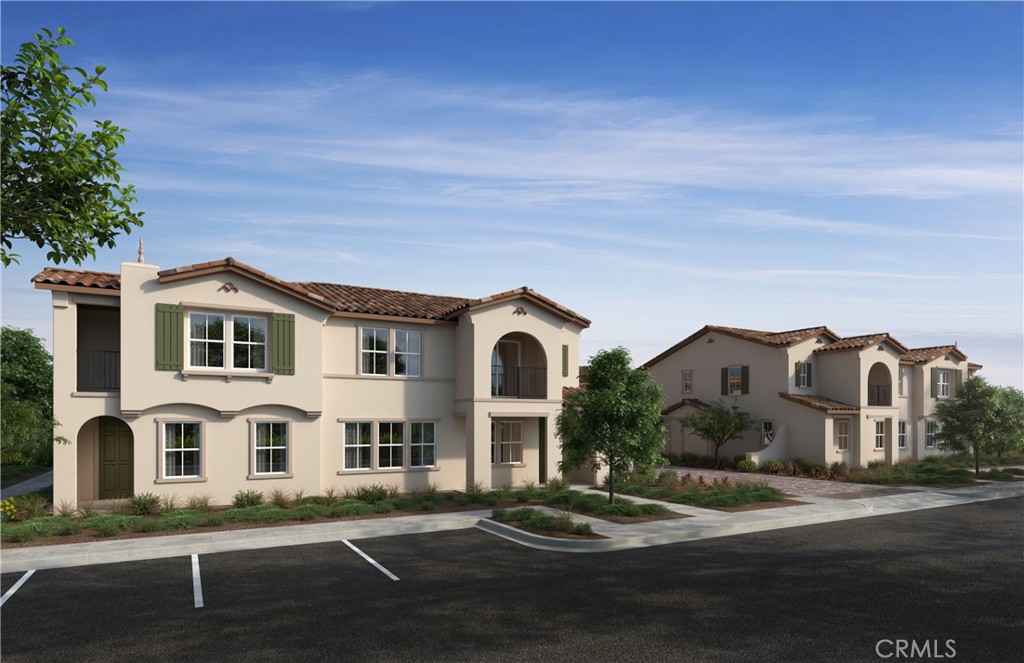 Belmont at Sunset Ranch is a beautiful resort-style community in the heart of Ontario Ranch. This floor plan offers 2,051 sq/ft of open floor plan spread across 2 floors. Take note of the expansive 9-ft ceilings bringing a nice vaulted feel at the first floor when you walk in. This open floor plan features the living, dining and kitchen downstairs. The stylish kitchen features white shaker door cabinets, large kitchen island, walk in pantry, dining area, upgraded quartz counter tops and luxury vinyl plank flooring throughout the downstairs. Our homes offer brand-new Whirlpool® stainless steel appliances including a slide in gas stove, dishwasher and microwave. Additionally, the powder room and laundry room are downstairs. The upstairs leads right into an open loft the family can enjoy and two secondary bedrooms nearby. Those two bedrooms share a large hallway bathroom and has a tub/shower combination with double sinks. The spacious primary bedroom with a large walk-in closet, adjoining bath with cultured marble counter tops, dual sinks, an extended vanity with knee space and walk-in shower. There is also a private balcony from the primary bedroom for you to relax at after a long day at the office with the view of the Pool. Each home is built with uncompromising energy efficiency in mind such as a tankless water heater, smart thermostat, dual-pane low E glass windows and so much more to help ensure uninterrupted comfort all year long. All that is complemented by a solar energy system as well to maximize savings. Community amenities include two parks, pool and spa, dog park, and pickle ball courts. Easy access to the I-15, I-10, and 60 Freeways nearby. You are also close to shopping at Costco®, 99 Ranch Market, Cloverdale Marketplace and Eastvale Gateway. Ontario International Airport and Ontario Mills Mall are also just a short drive away. Belmont is conveniently located just 2.5 miles away from the brand-new Park View elementary school.
Photo is a rendering of the model. Solar is included!