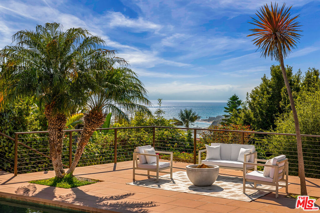 Located in the highly desirable Castellamare neighborhood of Pacific Palisades, 207 Tranquillo presents a rare opportunity to build your dream home on a prime 6,853 square foot lot with sweeping ocean and mountain views. Surrounded by an entire block of standing homes, 207 Tranquillo represents a fantastic opportunity to rebuild in a wonderful, close-knit community. Tranquillo Rd. is well-located with easy access to Pacific Coast Highway and the Palisades Village, putting beaches, boutiques, dining, and top schools just minutes away. The original home measured 2,656 square feet. The pool and hardscaped patio remain intact, offering a solid foundation for your future build. Phase 1 and Phase 2 debris removal have been completed. 207 Tranquillo offers an unmatched combination of views, location, and community. Don't miss this chance to become part of one of the Palisades' most beloved neighborhoods.