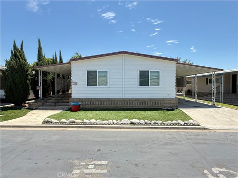 Photo of 2230 Lake Glen Drive #57, La Habra, CA 90631 (MLS # DW26138889)