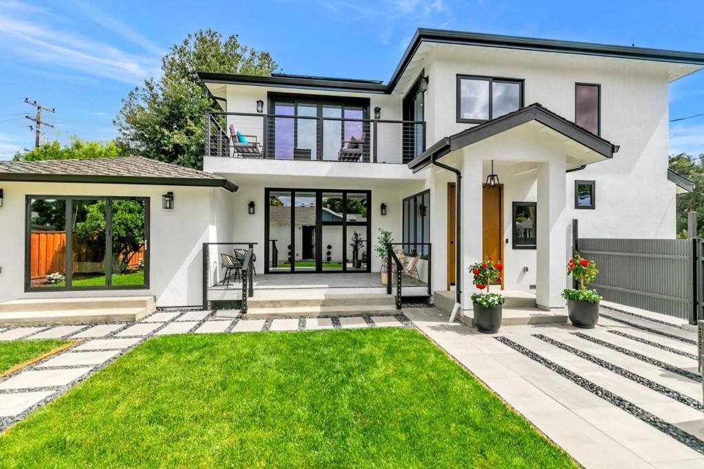 Welcome to 665 Hawthorne Ave, a modern showstopper almost entirely rebuilt in 2025. This home blends modern elegance with functionality, making it perfect for those who appreciate design and comfort. Step into the chefs kitchen, equipped with stunning wood cabinets, double oven, and large kitchen island. The adjoining dining area offers seamless indoor-outdoor living, thanks to bifold doors leading to a private covered patio and an expansive yard. This home features two living areas, conveniently located on both the first and second floors, and boasts five bedrooms, three with ensuite bathrooms. Each floor has an oversized primary suite, each with a custom closet, luxurious bathroom, and bifold doors that open to the outdoors. Situated on a large corner lot, this home epitomizes California living with multiple yard access points. Just minutes away from the lively Downtown Campbell and The Pruneyard, enjoy easy access to vibrant restaurants, coffee shops, parks, and the Sunday farmers market. Conveniently located near Trader Joe's and Whole Foods, this home ensures that all your needs are met. With easy access to multiple freeways, commuting is a breeze. Don't miss this one-of-a-kind home!