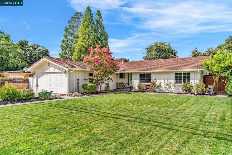 Welcome to this charming home that is tucked into a quiet neighborhood, offering both privacy and an inviting sense of community! 4 Bedrooms | 2 baths PLUS a detached studio with an additional full bathroom! Sparkling, updated chef’s kitchen with gleaming slab quartz Cambria counters, stainless steel appliances, freshly painted cabinets and an additional kitchen preparation area with great storage. A light and bright family room boasts a wood-burning fireplace insert with a brick hearth and surround, recessed lighting and recently painted interior walls. Other amenities include: recently refinished rich oak hardwood flooring, dual pane windows and beautiful crown moldings. A spacious primary suite features a beautifully updated ensuite bath and sliding French doors opening to the peaceful yard setting. The detached studio with a combination pull-down murphy bed/desk and a full bathroom - great as an in-law/au-pair or home office! For the car enthusiast - a two car attached garage PLUS an additional detached shop for extra car storage, hobbies, and more! Boat/RV Parking. Peaceful and private back and side yard with entertaining patios, a sparkling swim spa with an outdoor shower and a spa/steam shower, a backdrop of mature trees and a lush, level and expansive front lawn!