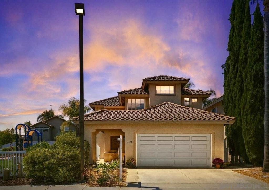 Welcome to 1593 Avenida Guillermo, a beautifully maintained home in the highly desirable Rancho Del Oro community, offering 2,196 sq. ft. of comfort, style, and functionality. This spacious 4-bedroom, 3-bath corner-lot property features a full bedroom and bathroom on the first floor, ideal for guests, multi-generational living, or a home office. Outdoor living shines with a private backyard and patio, perfect for gatherings, gardening, or quiet evenings, and the home is right next to the community playground, making it a dream for families. Additional highlights include a brand-new Whole House Fan for energy efficiency and an attached garage providing convenience and extra storage. Soaring high ceilings and a bright, open floor plan create seamless flow between the living, dining, and kitchen spaces perfect for entertaining or relaxing with family. The main level showcases durable laminate flooring and a welcoming family room with fireplace, while the upstairs primary suite features a large walk-in closet, generous natural light, and ample privacy. Rancho Del Oro is known for its family-friendly environment, tree-lined streets, multiple parks, and great schools, all while being just minutes from shopping, dining, and the beautiful Oceanside beaches. With easy freeway access, commuting to neighboring cities is a breeze. Don’t miss this opportunity 1593 Avenida Guillermo combines location, lifestyle, and move-in-ready living all in one! First-time homebuyers and VA welcomed!