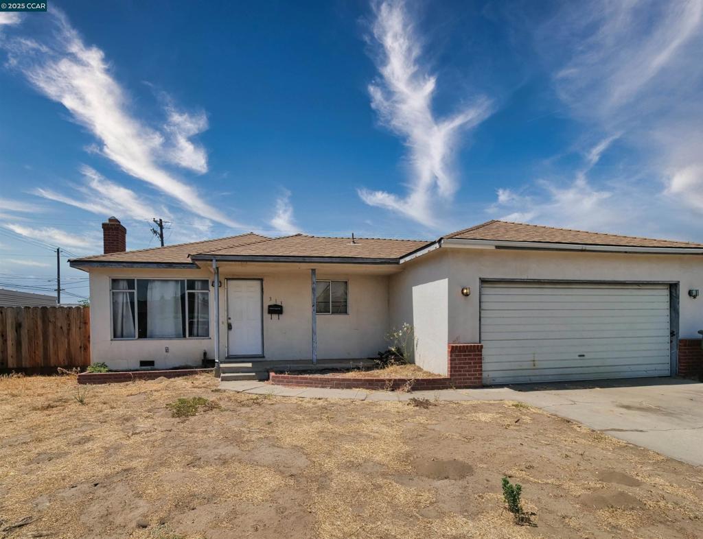 Opportunity is knocking... this Ranch style “diamond in the rough” in Manteca is ready for its new owners to update it using their own taste, creativity and ideas. The efficient floorplan offers a total of 1,092 square feet of living space, including a Family Room, 3 Bedrooms, 2 Bathrooms, and a Kitchen with a Dining area. Additionally, this property has an attached 2 stall garage, a newer roof and new fencing all around. Conveniently located close to the 99 and 120 interchange, and close to parks, restaurants, and shopping. Come tour this property today and imagine the possibilities.