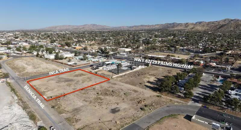 One-acre industrial parcel just off Twentynine Palms Highway at the entry to Yucca Valley. Uniquely zoned, Old Town Industrial/Commercial (OTI/C) offers a substantial range of permitted industrial (manufacturing, processing, etc.), commercial (retail, service, etc.), and residential uses in the Old Town specific plan area. Utilities are available at the street. ANP's: 0586-081-09. Neighboring parcel also available for sale.