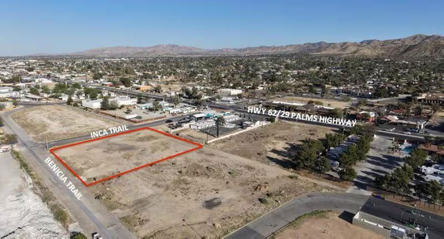 One-acre industrial parcel just off Twentynine Palms Highway at the entry to Yucca Valley. Uniquely zoned, Old Town Industrial/Commercial (OTI/C) offers a substantial range of permitted industrial (manufacturing, processing, etc.), commercial (retail, service, etc.), and residential uses in the Old Town specific plan area. Utilities are available at the street. ANP's: 0586-081-09. Neighboring parcel also available for sale.