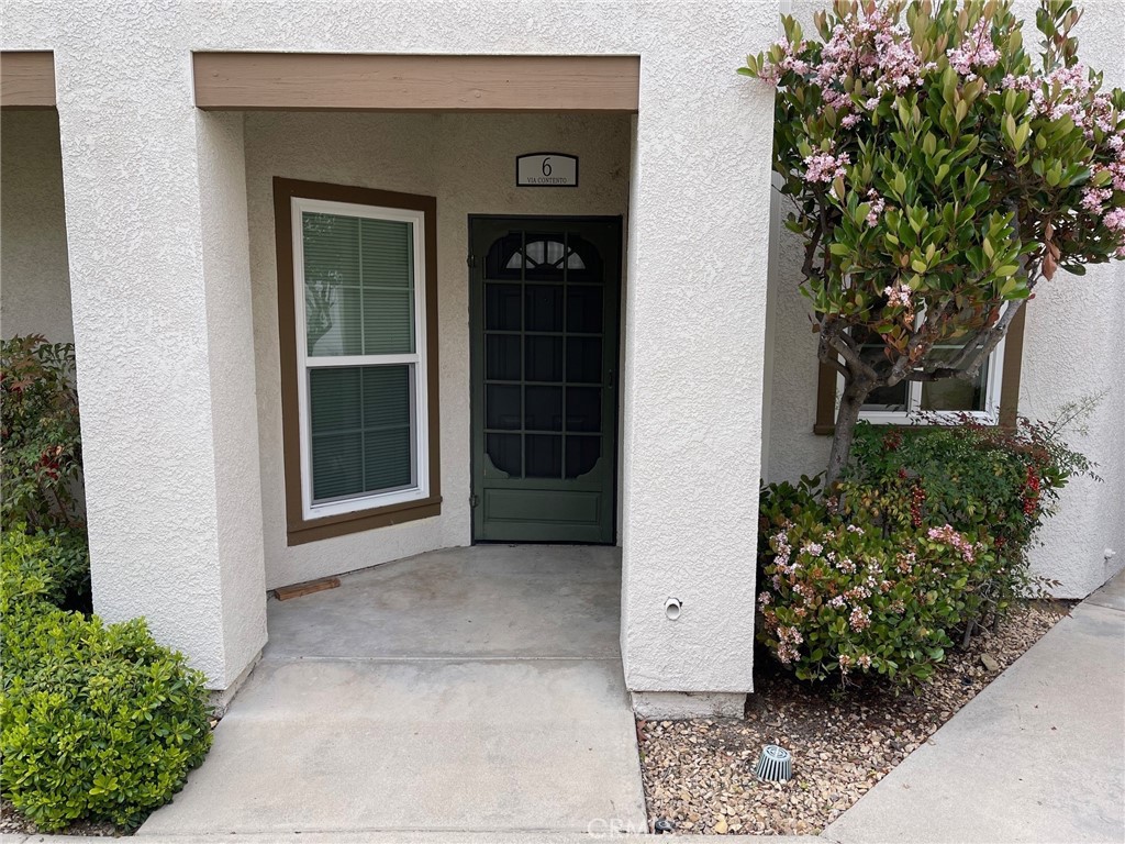 Welcome to Tijeras Creek Villas. This one is a beauty. Do you like remodeled? How about a new kitchen, new bathrooms, new paint, new flooring, new cabinetry, new countertops, new appliances (washer/dryer/refrigerator/stove included) and much, much more. You will love this one. The garage is walking distance to the front door, and the second guaranteed parking(carport) is not far away.