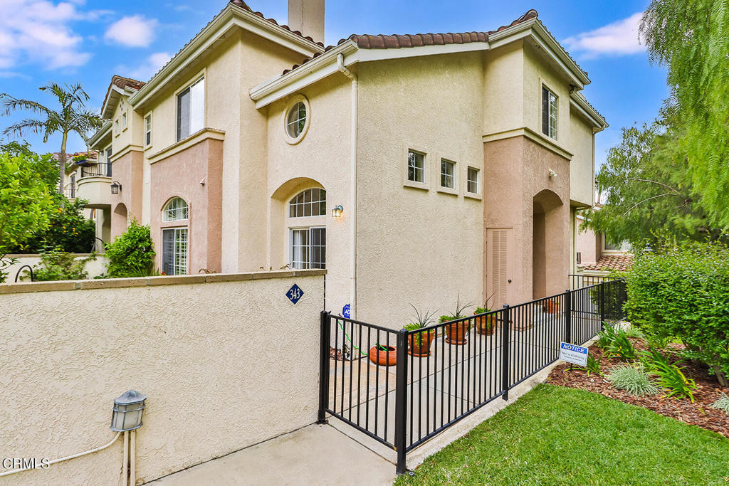 This outstanding 3 bed, 3 bath end-unit townhome will amaze you! Not only It offers a private and quiet location within the complex but the complex is in a prime location: in the desirable Hillcrest corridor, adjacent to Westlake Village, close to restaurants and shopping. Here's the best of this home: It's a SMART home: it features front door keyless programable pad; Alexa in all rooms; programable indoor/outdoor lights, doorbell camera; full ADT alarm system with programable phone system; B hyve Wi-Fi watering system; phone controlled thermostat; 2-indoor security sensors; outdoor cameras (HOA Approved); my Q smart garage door opener and more! This outstanding home offers an open floor plan with soaring ceilings and high windows in the living room, bringing abundant natural light. A fireplace compliments the space while sliding doors lead to the oversized private patio to enjoy the outdoors. Adjacent to the living room is the dining room and the large kitchen with granite countertops, Bosch appliances, plenty of shaker style cabinets and a walk-in pantry. There's a bedroom downstairs with a full bathroom and closet. This room currently used as a hobby room. Upstairs is the large master suite featuring vaulted ceilings, an ensuite bath with dual sinks, a tub, shower and a walk-in closet. There's a loft area which can be used as an office, hobby room or play room. The 2-car garage is downstairs with direct access to the house. The seller is offering to cover 6 months of HOA dues at closing. Don't miss out! Come see it today!