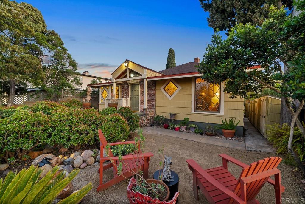 NOTE NEW PRICE! Beautiful Craftsman home in historic Golden Hill, featuring a newly added upstairs apartment! Offset your mortgage with rent or enjoy multi-generational living. Recent updates include a new kitchen, a renovated primary bedroom & attached bathroom, a new laundry room/bathroom, fresh interior/exterior paint, updated electrical and updated foundation. The original 1924 built-ins and home office, located just off the spacious living room, add to the home's character. The first floor boasts three bedrooms and three baths. The upstairs apartment (which can be accessed from inside the home or an exterior staircase) includes a bedroom, a living room (utilities stubbed to add a kitchen), a bathroom, laundry hook-ups, and a private balcony with views of the Bay & Downtown skyline. Additionally, the property offers five onsite parking spots (including gated space for RV or boat) off the alley. Relax and unwind in the beautifully landscaped and spacious front yard or the private backyard on the large, level lot. Multiple storage sheds located alongside the house. Enjoy easy walking access to some of San Diego’s best restaurants and cafes in South Park and Golden Hill. Convenient central location with proximity to freeways and has easy access to Downtown amenities including Petco Park. Potential to add additional units or ADU’s behind the house.