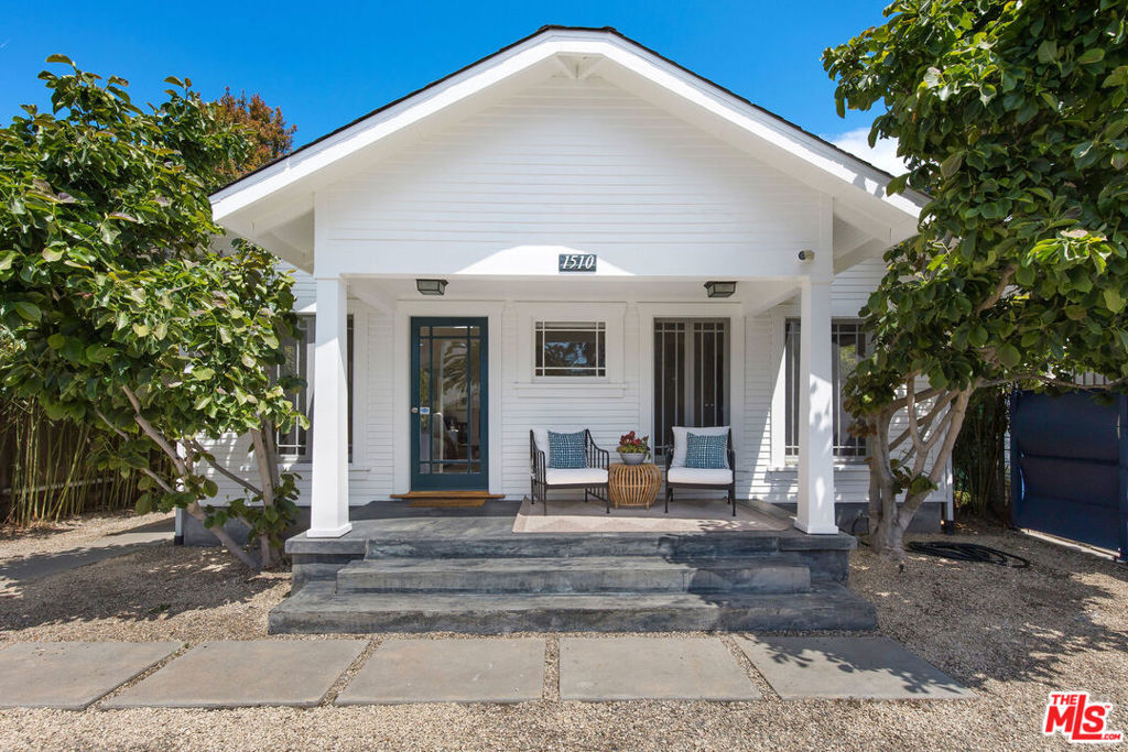 Iconic Venice Craftsman on One of the Largest Lots West of Lincoln! Welcome to 1510 Electric Avenue, a rare opportunity to own a character-filled Venice Craftsman with incredible potential and prime location. Set on one of the largest lots west of Lincoln Blvd. (approx. 6,030 sq. ft.), this exceptional property features a charming front home plus a detached two-story building with two income-generating rental units. Just one block from Abbot Kinney and moments from the beach, this property offers the kind of location and versatility that rarely hits the market. The sunlit front home is a 2 bedroom + 2 bathroom with a flex space that could be a 3rd bedroom (approx. 1,300 sq. ft.) featuring hardwood floors, a skylit shower, in-unit laundry, bonus attic space, and a welcoming front porch. Delivered vacant, it's perfect for an owner-user or a stylish rental. The rear building includes two tenant-occupied units, providing immediate rental income. In total, the triplex offers 5 bedrooms and 4 bathrooms across approximately 2,438 sq. ft. of living space. Enjoy generous outdoor areas, including a private front yard and a lush, secluded back garden ideal for entertaining, relaxing, or soaking in the iconic Venice lifestyle. Additional highlights include solar panels, two off-street parking spaces, and timeless architectural charm. Tucked away on one of Venice's most sought-after streets, you're just steps from Gjelina, Intelligentsia, the boardwalk, and all the energy of Abbot Kinney. This is a truly special property offering space, style, and flexibility in an unbeatable location.