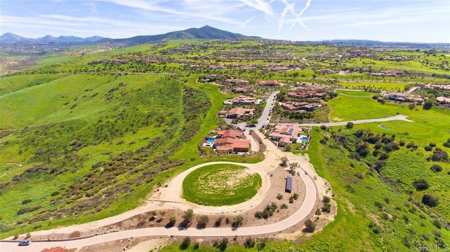One of the Final Opportunities to build in Santaluz... Premium Homesite with Spectacular Views! Don’t miss one of the last remaining homesites behind the gates of the prestigious Santaluz community...a truly rare offering that hasn’t been available in years! This extraordinary lot at the end of the cul-de-sac is perched on a private hillside, capturing breathtaking, unobstructed vistas of Lusardi Creek, the surrounding valley, distant mountains, and vibrant sunset skies often dotted with hot air balloons. Enjoy 360-degree panoramic views and ultimate privacy on this expansive homesite. Whether you envision a sprawling single-level estate or a striking two-story residence, the flexibility is here: build up to 11,080 sq ft under roof, with 8,500 sq ft as a single level or 9,000 sq ft as a two-story home. Plans are available to help bring your dream to life. This is more than just land—it’s a once-in-a-generation opportunity to craft your custom sanctuary in one of Southern California’s most coveted golf communities. Don’t let this incredible opportunity slip away.