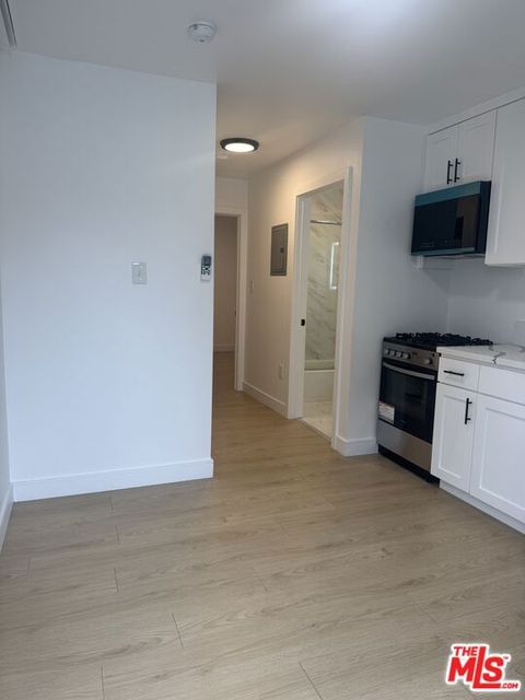 Photo of 4013 S Walton Avenue #1/2, Los Angeles, CA 90037 (MLS # 26655943)