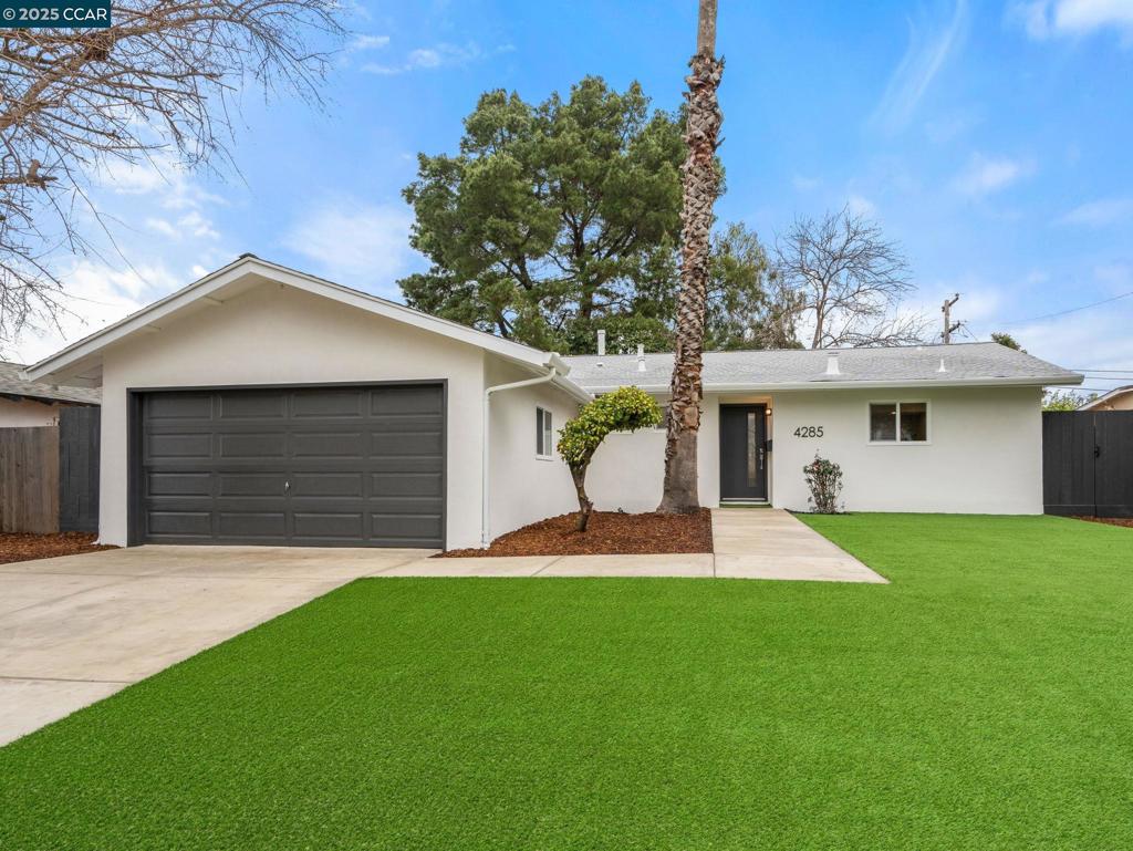 Welcome to this beautifully upgraded single-story home offering modern comfort and style. Featuring new luxury vinyl flooring, a bright family room, and spacious dining area, the home flows into a stunning kitchen with a large island, quartz countertops, and brand-new stainless steel appliances. Enjoy four comfortable bedrooms and remodeled bathrooms with sleek tile, lighting, and finishes. The fourth bedroom offers potential as a Junior ADU with separate access. The private backyard includes a low-maintenance landscaped yard, patio, and a large side yard with potential RV/boat parking. Freshly painted and move-in ready—this home blends style, space, and convenience.