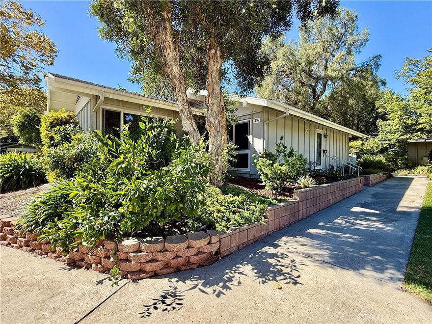 Remodeled single level, end unit cottage home located in quiet, beautiful area close to Clubhouses 1 & 3 and great walking areas! "San Sebastian" co-op - a popular floorplan with vaulted ceiling in the living room, front and back doors, windows facing every direction for great light and breezes and only one shared wall. Upgrades include fresh paint, smooth ceilings, dual pane windows (except for living and dining areas), brand new heat pump, inside laundry, new faucets and fixtures, 2 separate bathrooms (not Jack and Jill type), water resistant laminate flooring and new baseboards for an updated look. Living room and bedroom windows feature Hunter Douglas electric honeycomb room darkening blinds. Beautiful walk-up from the very close carport (check it out - it is marked with a sign) through the lush greenbelt area to your front door. Inside, the living room features vaulted ceiling, sliding door and window leading the patio area. Patio wall has been lowered to enjoy the green outlook! Adjacent dining area has door leading to a shared back courtyard and ceiling fan with light. Kitchen contains HOA appliances and countertop plus upgraded recessed LED lights. Guest bathroom enjoys an oversized tile shower with glass enclosure and granite-topped vanity. Across the hall is the guest bedroom with great storage and large windows. Hallway closet houses WASHER/DRYER - there is currently an all-in-one unit included but can hold a stacked set. Primary bathroom has tub with tile surround and matching granite vanity. Primary bedroom is brightened by a large window area receiving the morning sun and holds ample closet space. EXPERIENCE THIS HOME IN THE WALK-THRU VIRTUAL TOUR - CLICK ON THE WHITE CIRCLES TO WALK-THRU, 360 ICON TO GO OUTSIDE AND WALKING PERSON ICON TO COME BACK IN!

Laguna Woods Village residents enjoy a 27-hole championship golf course, a 9-hole executive par 3 course, pickleball and tennis courts, lawn bowling, gyms, clubhouses, swimming pools, horse stables, gardening centers, artist studios, computer workrooms and classes + over 200 clubs and organizations.
