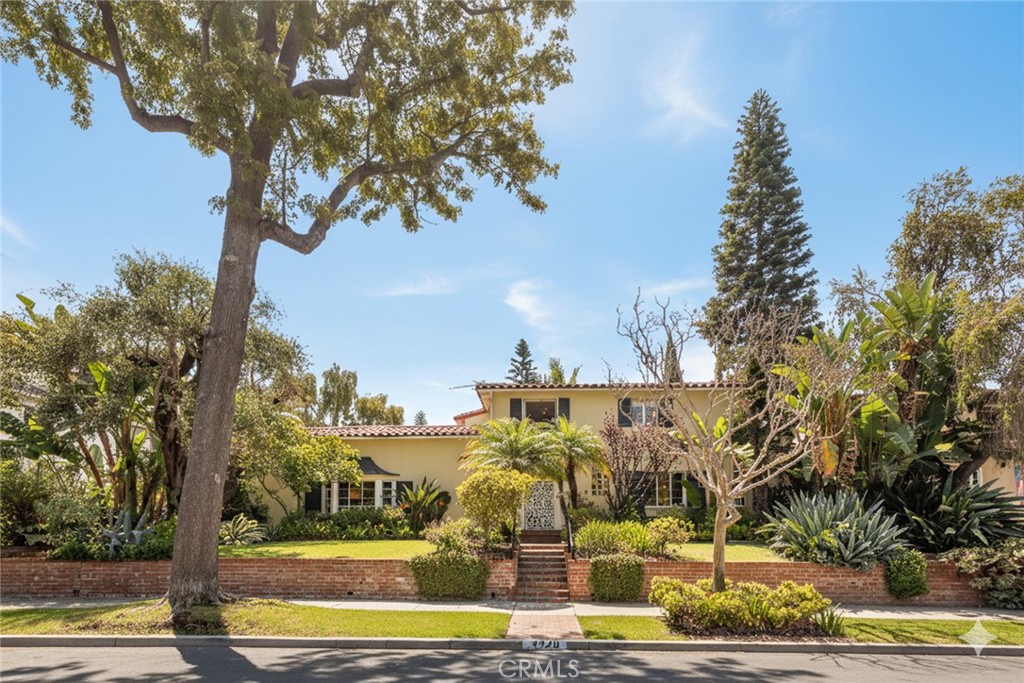 Step into this magnificent Classic Spanish Home on the Most Desired Streets in Bixby Knolls, Myrtle Avenue! A timeless blend of architectural elegance and spacious modern living. With 4 Bedrooms and 3 of the 4 Bathrooms recently updated, offering spacious living space on an expansive, over 9,000 sqft lot. Offers the Highly Desired Feature, an ensuite bedroom, located downstairs, perfect for long term guests or extended family living space. Classic details, include arched doorways, clay tile roof, high, wood-beamed ceilings, restored original hardwood floors, stunning original hardware throughout, including a hand wrought balustrade handrail from the 1930's. This chef's kitchen is a true culinary dream, with state-of-the-art Viking appliances and Wolf cooktop, and stunning custom countertops that are as generous as they are gorgeous- perfect for preparing meals in style. So rich in period character and architectural details, this very special home, you Must see for yourself! The spacious interiors provide seamless flow between living, dining and gathering areas. The private backyard is ideal for entertaining, gardening, or simply relaxing in your own private Secret Garden. Offering a 2 car garage with additional space for RV or boat parking if desired. Has Not been on the market in over 34 years! Don't miss experiencing this very exceptional home!