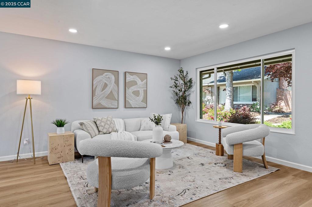 Stylish updates and modern comfort come together in this move-in ready 3-bedroom, 1.5-bath townhome, nestled in one of San Ramon's most desirable neighborhoods. Filled with natural light, the open-concept layout has been thoughtfully redesigned from top to bottom. The main level features a bright living room, dining area, updated kitchen, laundry, and a refreshed half bath. Upstairs, you’ll find a tastefully remodeled full bathroom and three spacious bedrooms for flexible, versatile living. Bask in the sun on your private patio. Plus, 1-car detached garage with extra off-street parking. Recent upgrades include contemporary luxury vinyl plank flooring, recessed lighting, designer finishes, and a beautifully remodeled kitchen with quartz countertops and stainless steel appliances. All major systems have been replaced, including the water heater, furnace, and central AC. Located in the sought-after Twin Creeks West community, residents enjoy access to greenbelts, trails, parks, and a community pool. Just minutes to the prestigious Twin Creeks Elementary and neighborhood shopping, dining, and commuter routes, this home blends comfort, convenience, and location in one turnkey package.