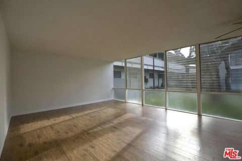 Photo of 11131 ROSE Avenue #13, Los Angeles, CA 90034 (MLS # 25618905)